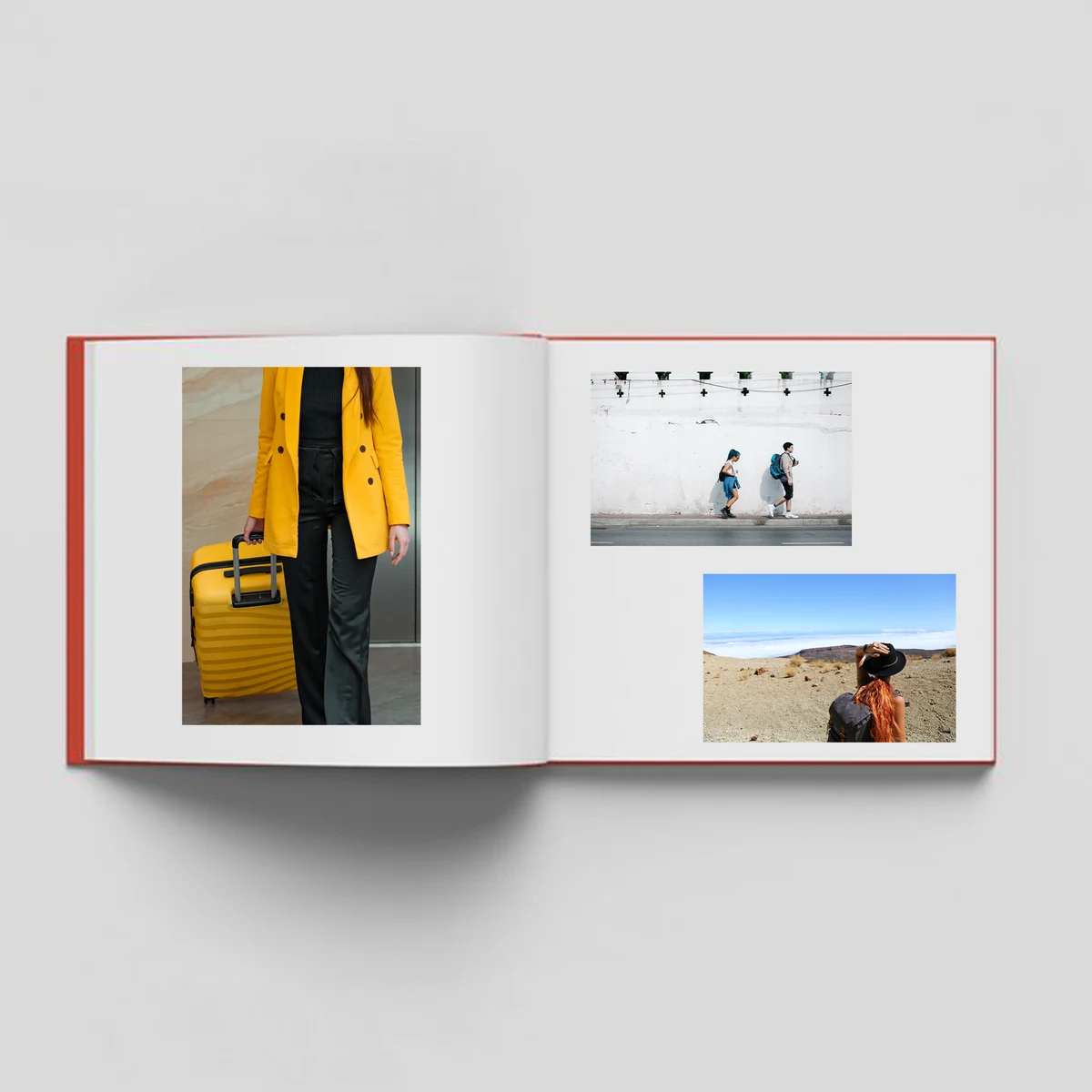 Open photo album with a portrait on the left and two landscape photos on the right
